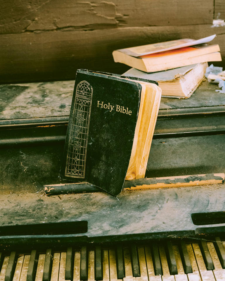 A Bible rests on the piano at Capote Baptist Church Right the building has been in the midst of a restoration since 2012 After Pastor Williams arrived its membership surged from 4 congregants to 85