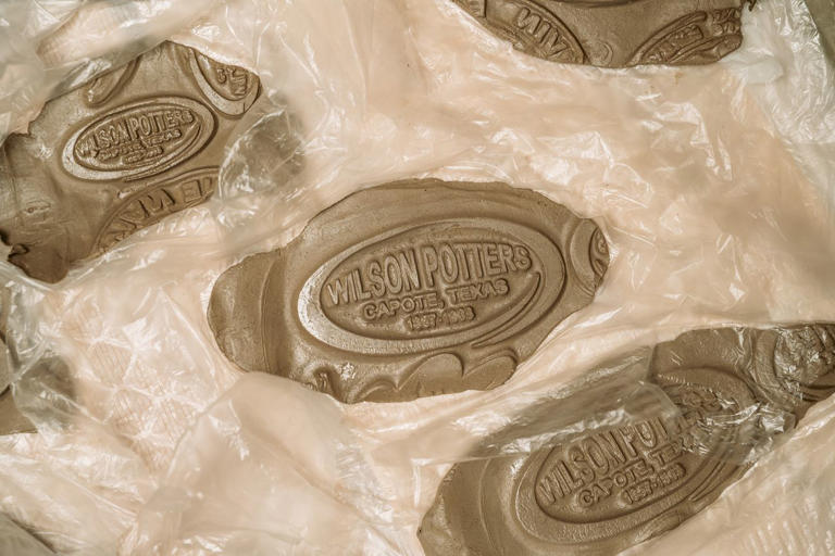 Modern replicas of the Wilson pottery logo created by Earline Green DeSean McClinton-Holland