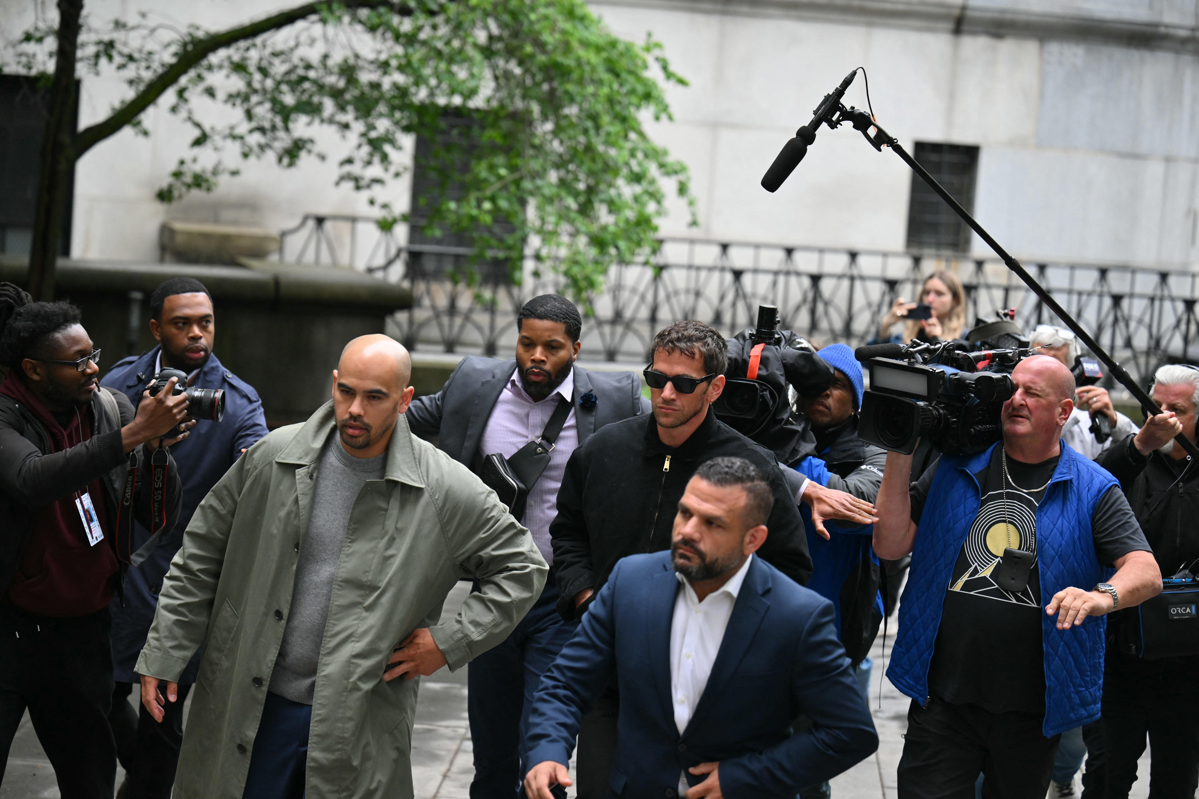 Alex Fine (R), Cassie Ventura's husband arrives at federal court for Sean "Diddy" Combs' sex trafficking trial in New York City on May 15, 2025.