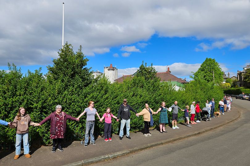 Campaigners 'hug' Glasgow bowling club as fight to save green space ...