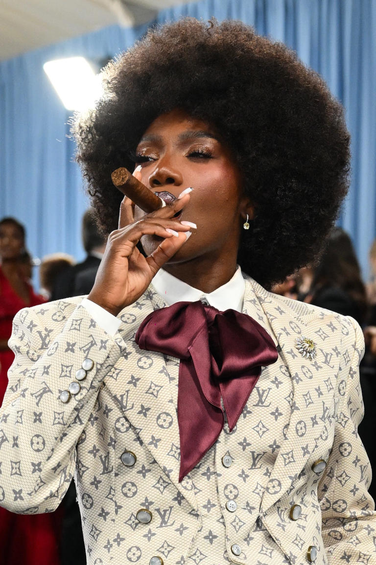 Doechii arrives for the 2025 Met Gala at the Metropolitan Museum of Art on May 5, 2025, in New York. The Gala raises money for the Metropolitan Museum of Art's Costume Institute. The 2025 Met Gala is themed "Tailored for You," aligning with the Costume Institute's exhibition, "Superfine: Tailoring Black Style," set to open to the public on May 10.