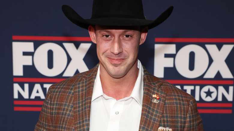 Johnny Joey Jones posing in a cowboy hat.