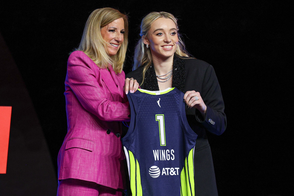 Paige Bueckers poses with WNBA commissioner Cathy Engelbert after being selected with the number one overall pick to the Dallas Wings in the 2025 WNBA Draft at The Shed at Hudson Yards. Vincent Carchietta-Imagn Images