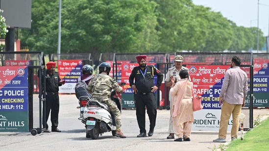 Security personnels stopping visitors at Chandigarh International Airport on Wednesday after air operations were suspended due to an airstrike on Pakistan.