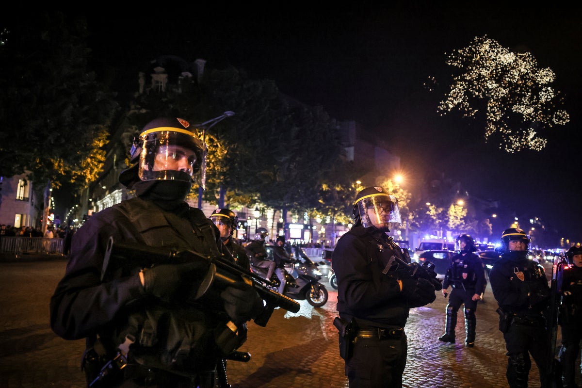 Chaos in Paris as car hits fans after PSG victory over Arsenal