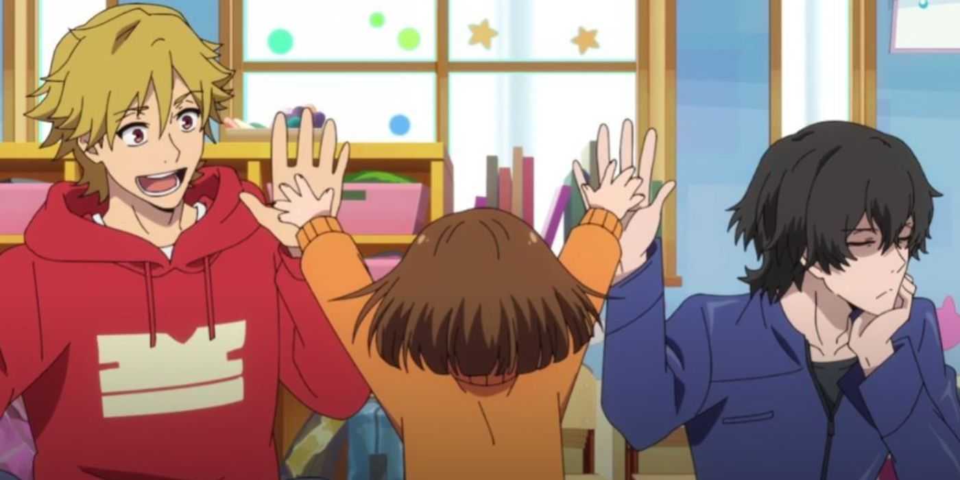 Kazuki, Miri, and Rei from Buddy Daddies high five each other.