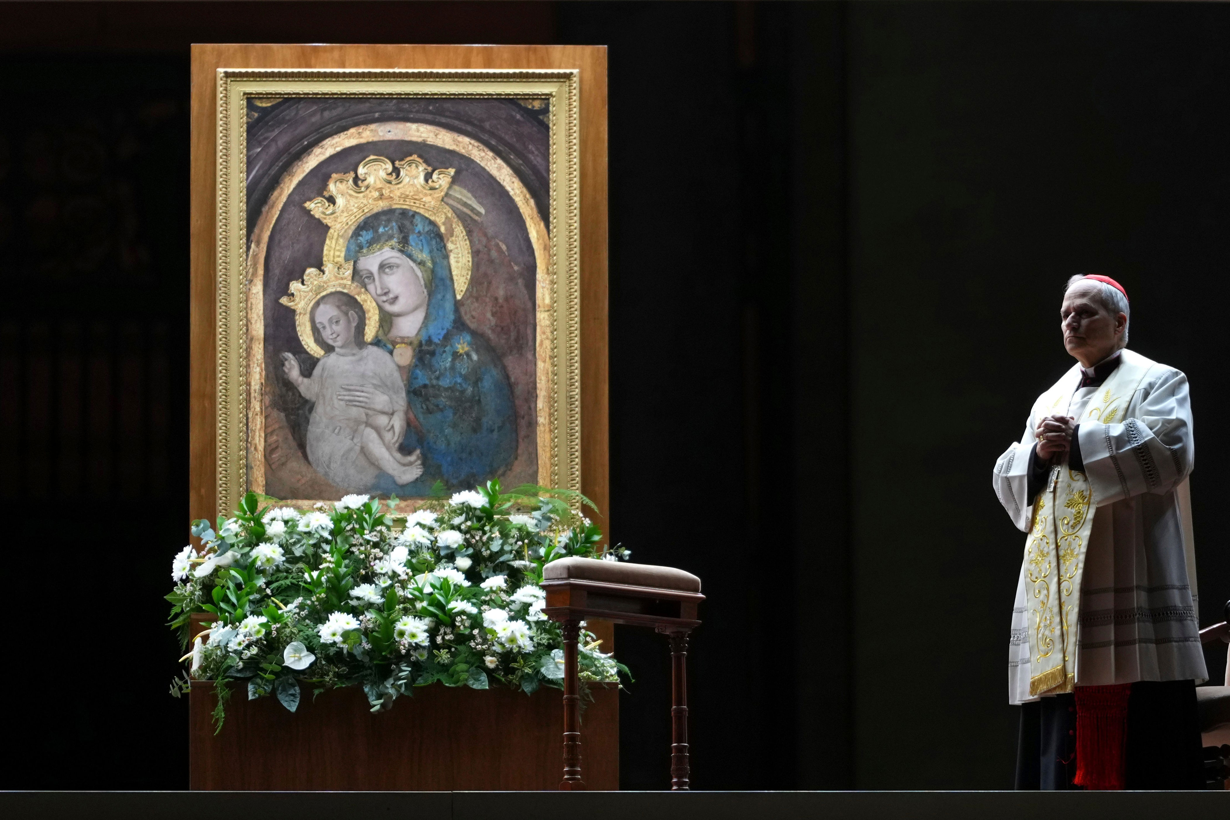 Prevost leads the recitation of the Holy Rosary for Pope Francis' health in St Peter's Square prior to the last Pope’s death (AP)