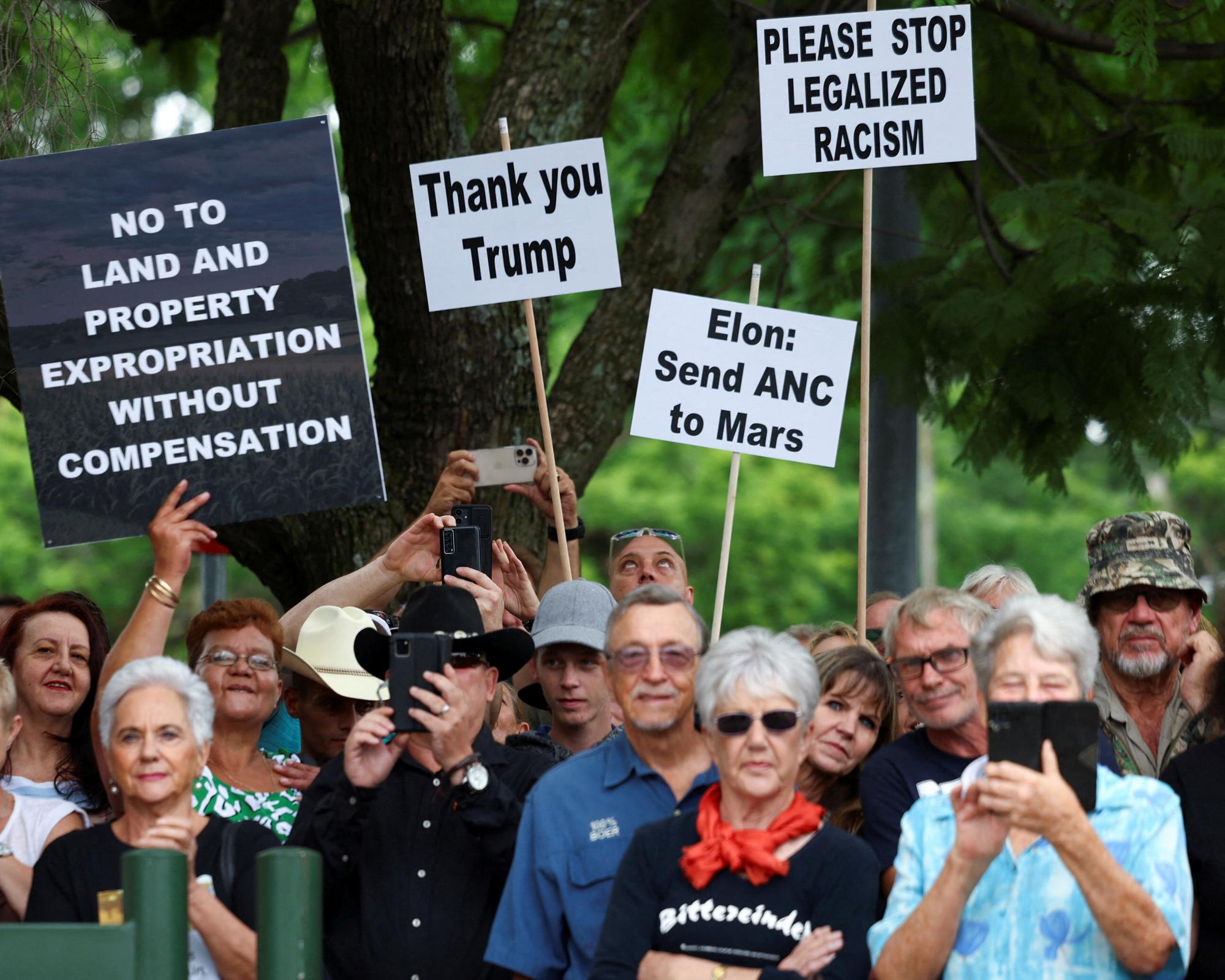 Supporters of President Trump’s stance on alleged discrimination against white people in South Africa protest at the US embassy in Pretoria in February. Photograph: Siphiwe Sibeko/Reuters