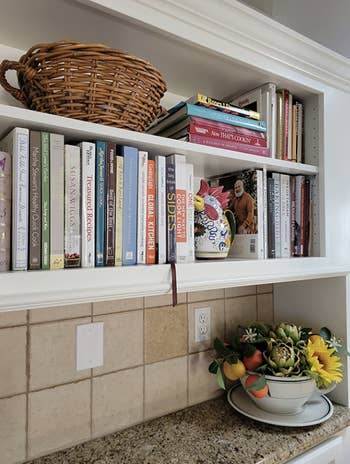 same area with cords and routers hidden by book product