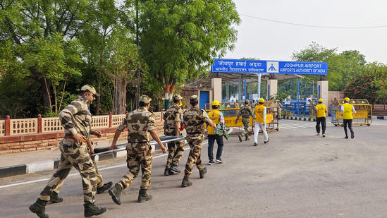 Jodhpur: Security personnel and others during a bomb threat mock drill at the airport, in Jodhpur, Rajasthan, Friday, May 9, 2025. (PTI Photo) (PTI05_09_2025_000327B)