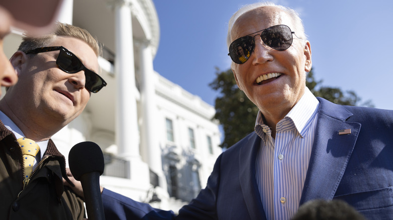 Peter Doocy and Joe Biden appear friendly at a press briefing.