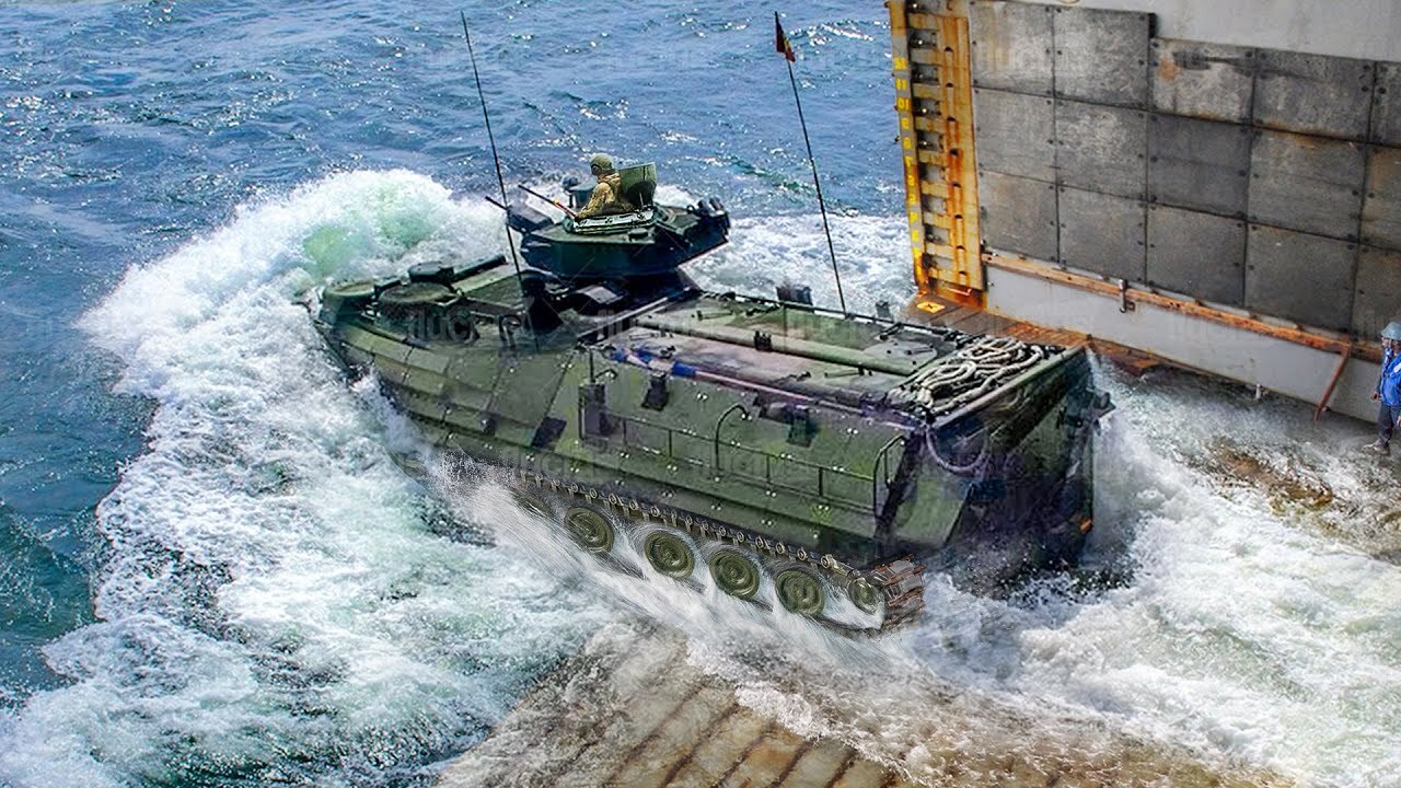 US Marines innovative use of armored AAVs for troop transport on land ...