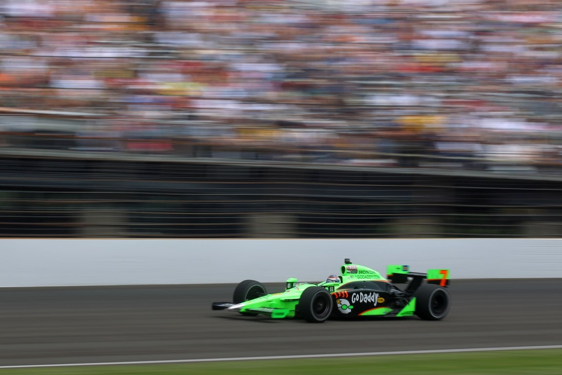 NASCAR icon and SI Swim model Danica Patrick, in photos