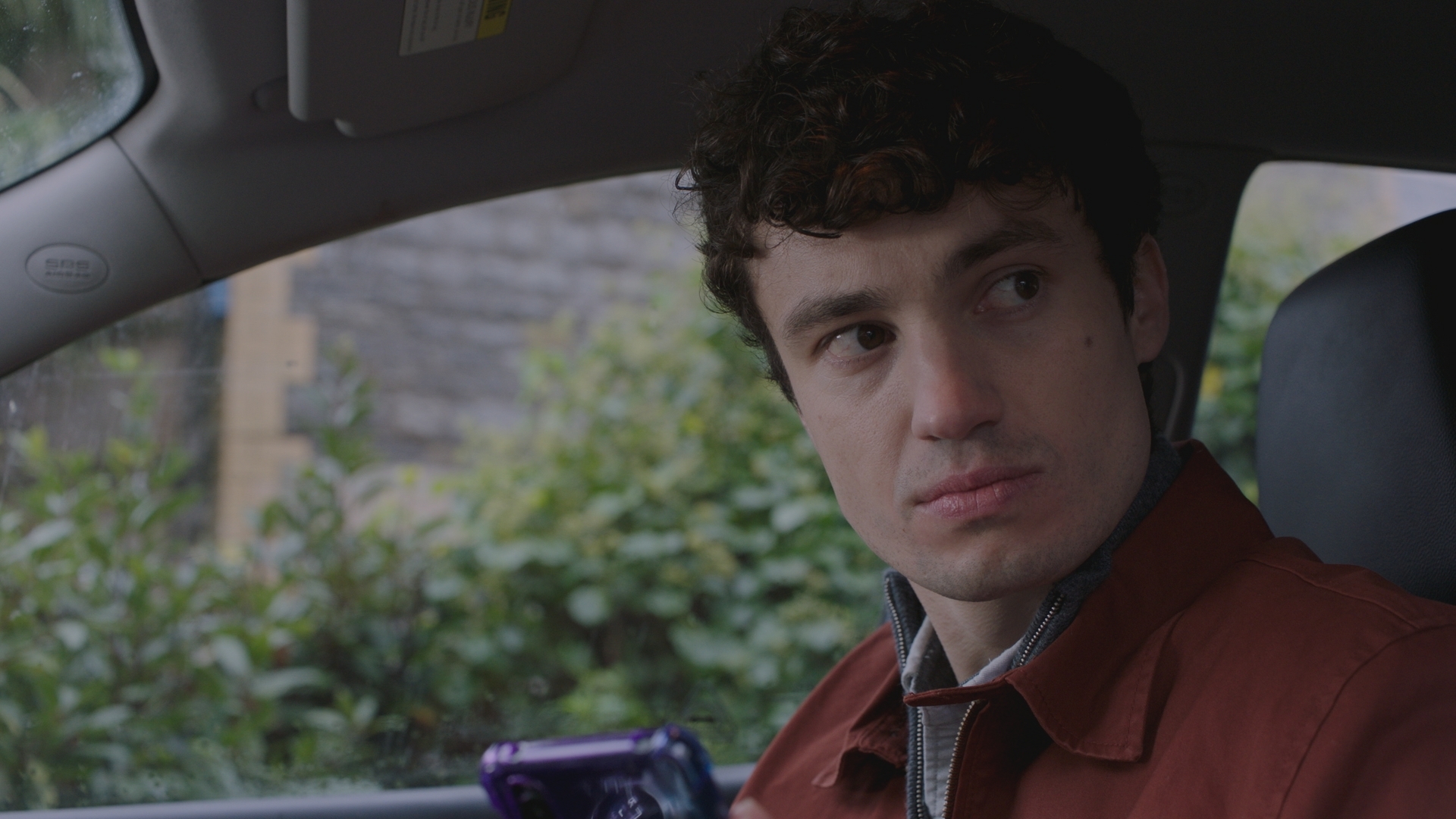 Sean uncovers Rida's secret when he sneakily reads messages between her and Nicole Piper. (Image credit: BBC STUDIOS. )