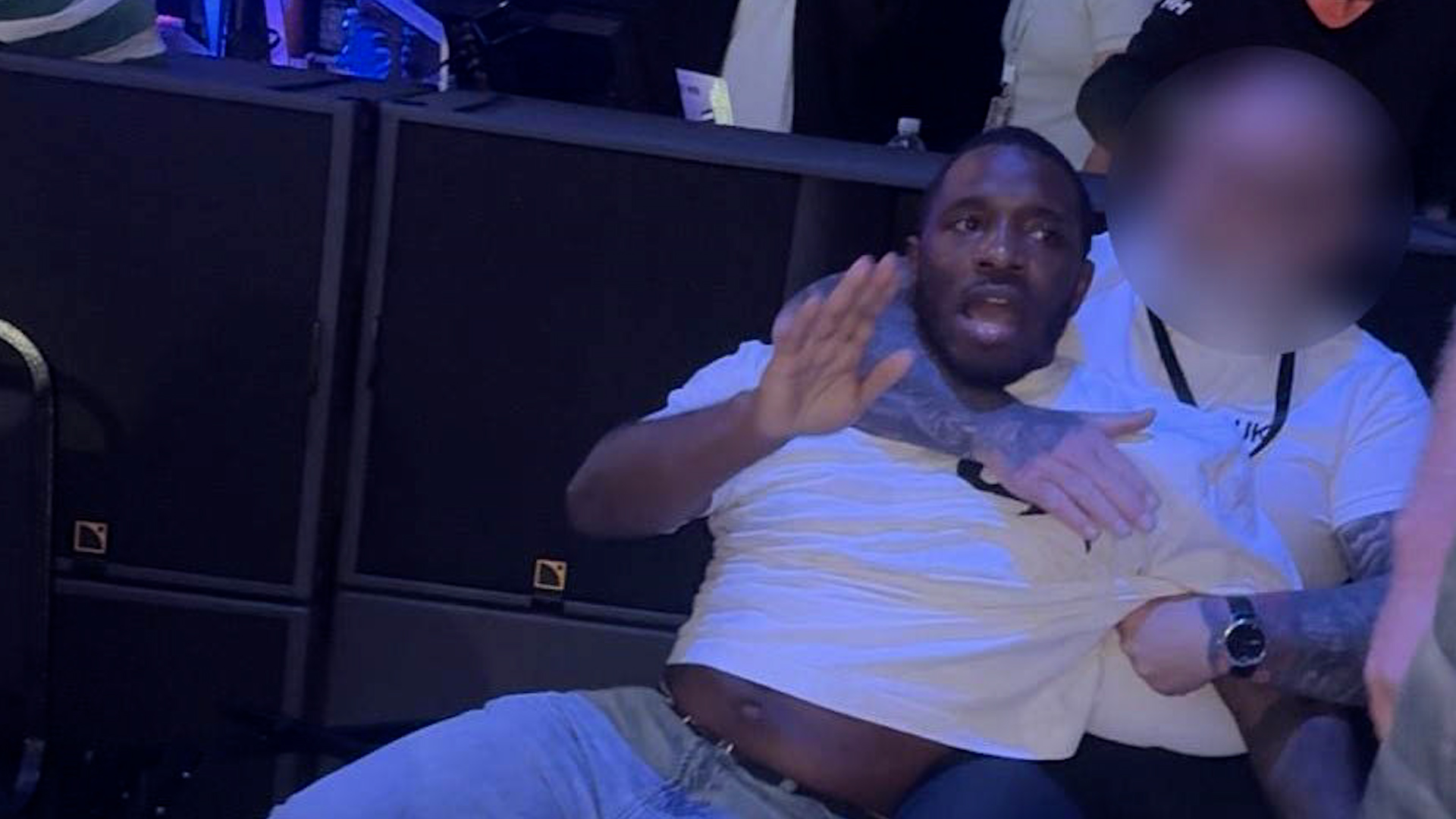 Rapper Konan held back by security during chaotic brawl at Misfits ...