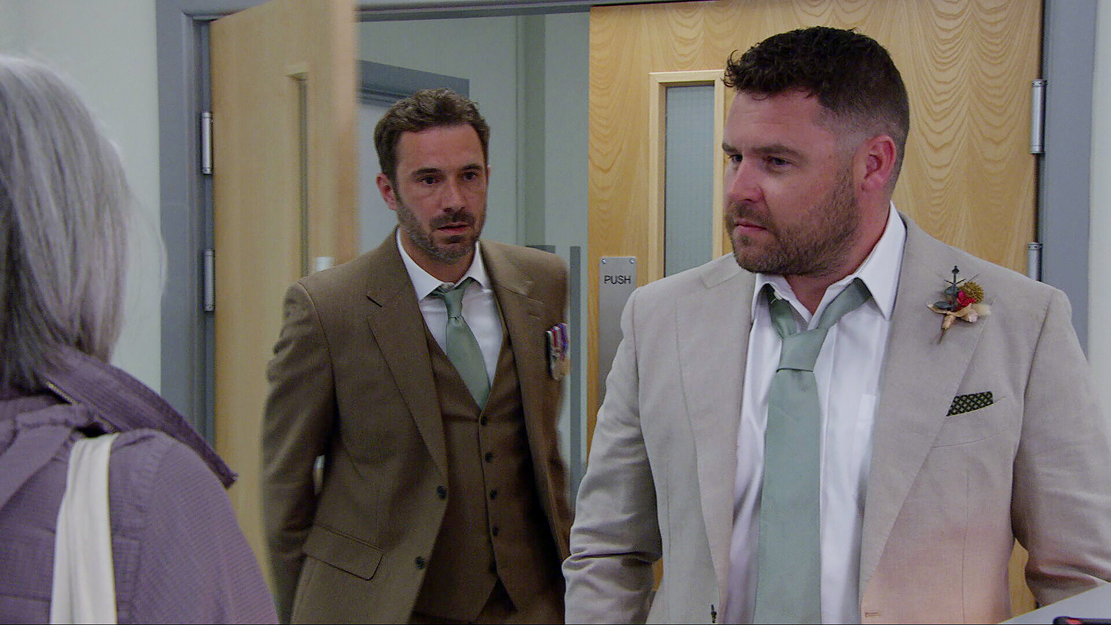 Aaron wants answers as he confronts John and his ex Aidan (Image credit: ITV)