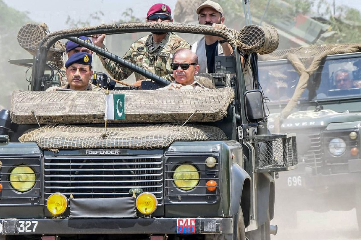 Pakistan’s PM Shehbaz Sharif (front, R) along with the country’s Army Chief General Syed Asim Munir (front, L) (IMAGE: AFP)