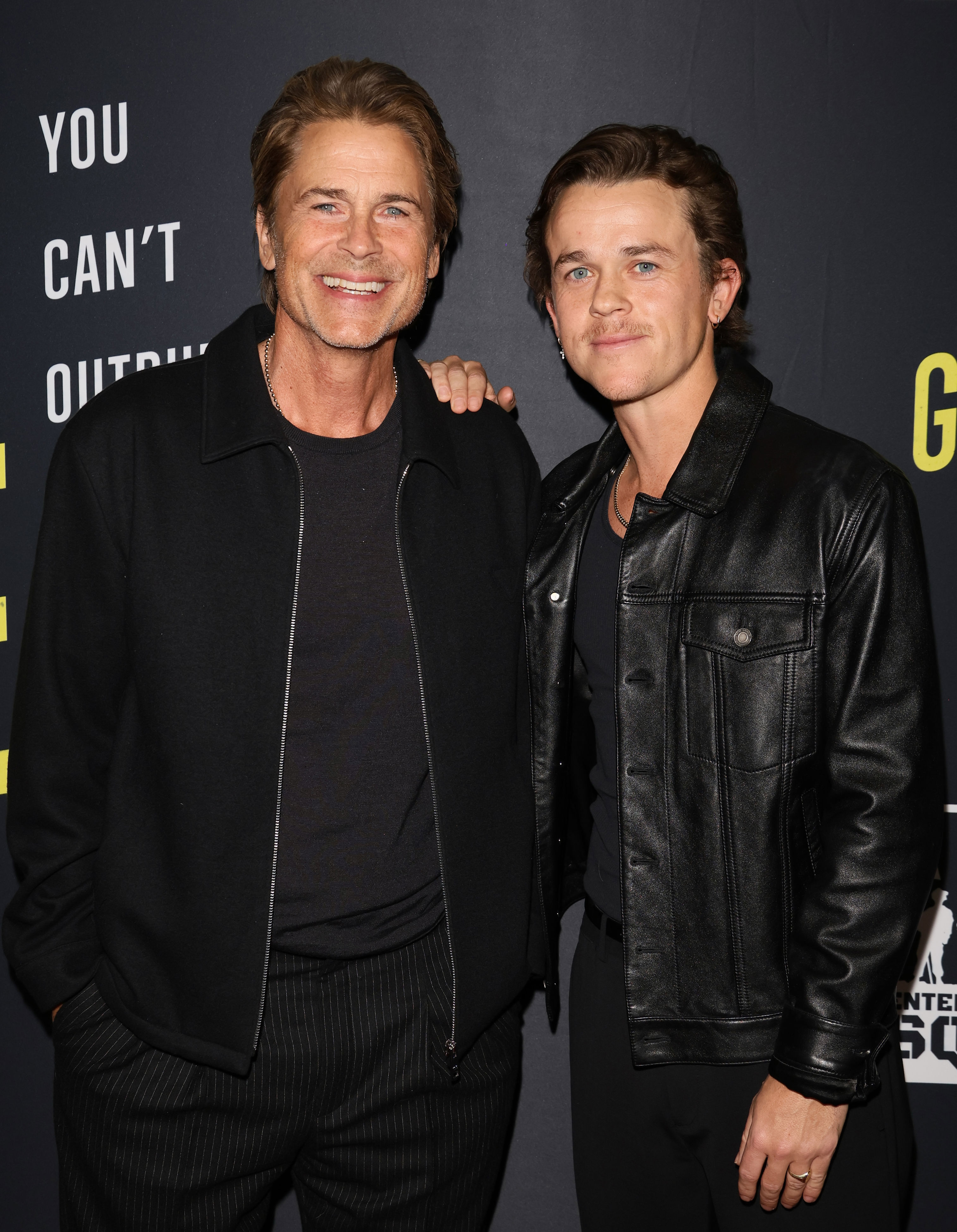 Rob Lowe, 61, and son John, 29, show off matching muscles in shirtless