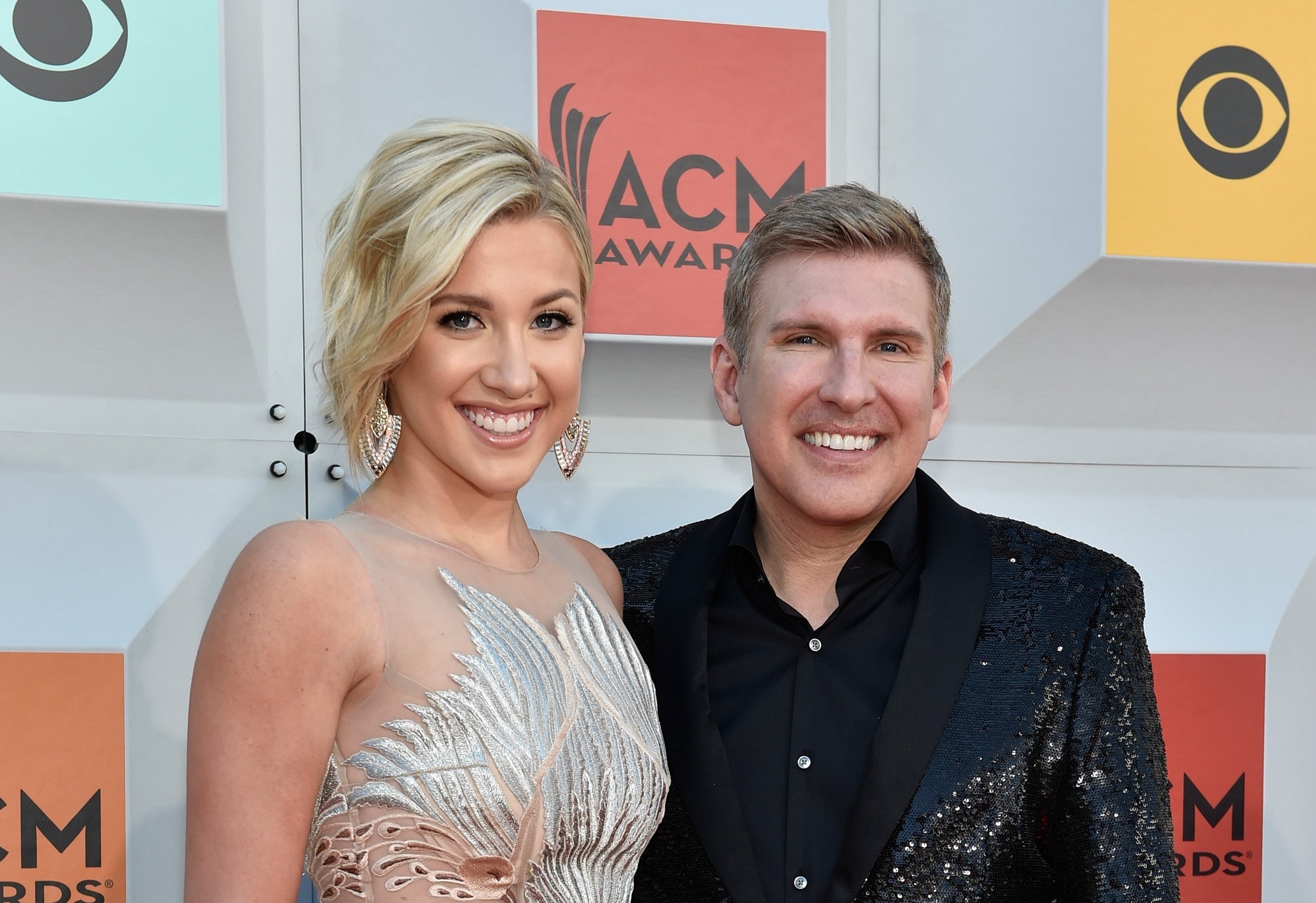 Savannah Chrisley, pictured with Todd Chrisley in 2016, has campaigned to secure the pardon for her parents from the Trump administration. Savannah revealed in an interview that Trump told her that her parents ‘didn’t look like terrorists’ and he wanted to give them ‘the full pardon.’ (Getty)