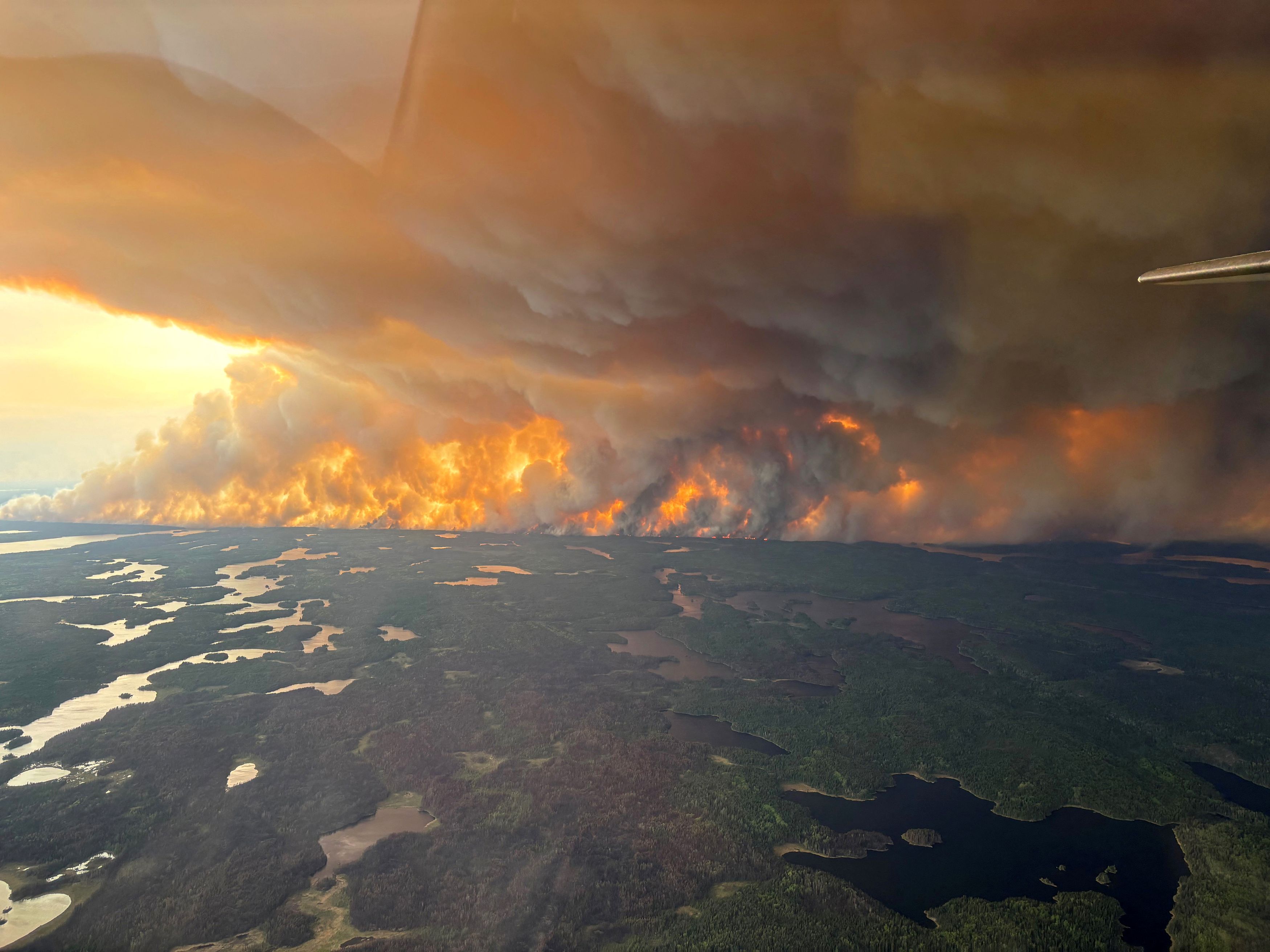 Canada wildfires force 17,000 to evacuate, with smoke blowing toward U.S.