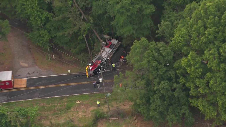 Driver cited after fire truck overturns along Upstate highway