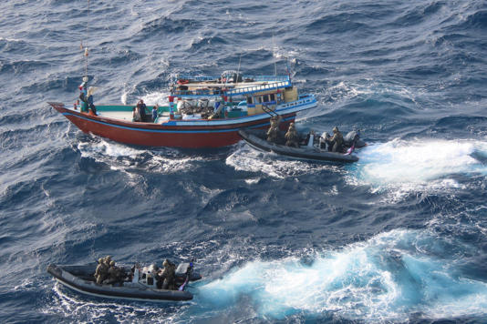 The Royal Navy teams board the dhow (Royal Navy)