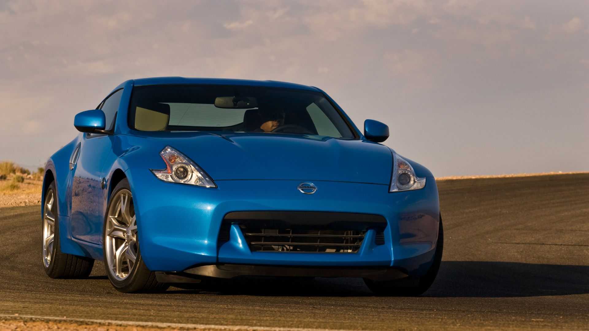 2009-2012 Nissan 370Z Coupe Blue Front Angle Track Driving