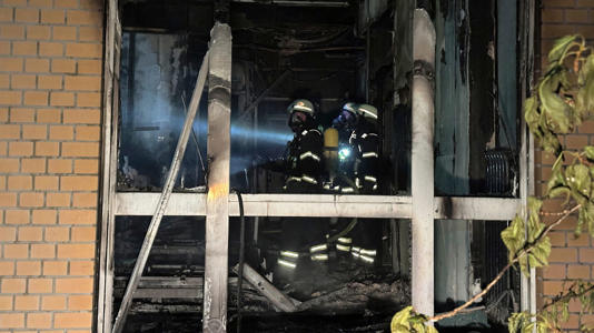 Firefighters at the hospital in Hamburg. Pic: AP