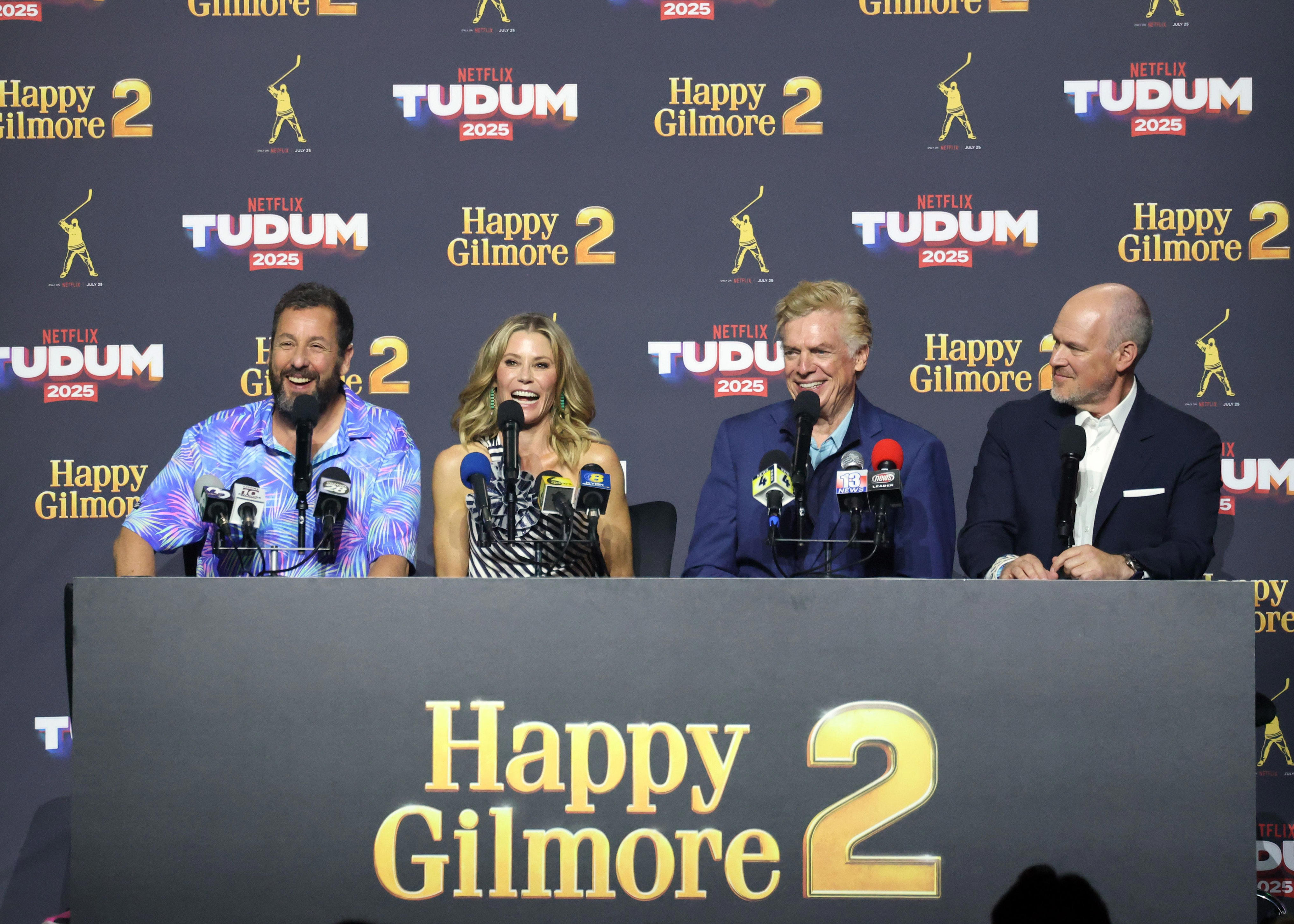 From left, Adam Sandler, Julie Bowen, Christopher McDonald and Rich Eisen speak during Netflix Tudum 2025 on May 31, 2025.