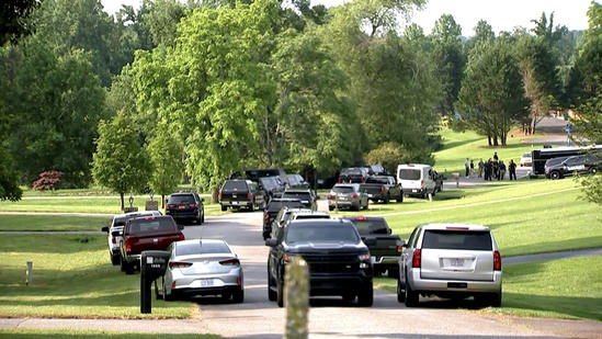 In this image taken from WSOC video, various police vehicles gather outside a community after a mass shooting, Sunday, June 1, 2025, in Hickory, a city in Catawba County, N.C.