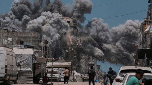 Smoke rises to the sky following an Israeli strike in Gaza City