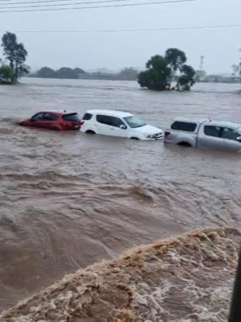 Footage Of Cars Homes Submerged By Floods