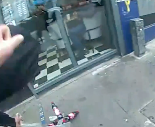 Bottles of soft drink roll out of Patrick Verry's bag as he is tackled (Metropolitan Police)