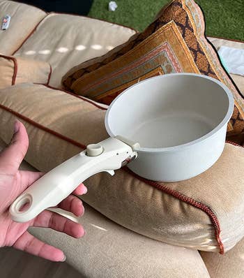 reviewer photo of the handle attached to one of the pots