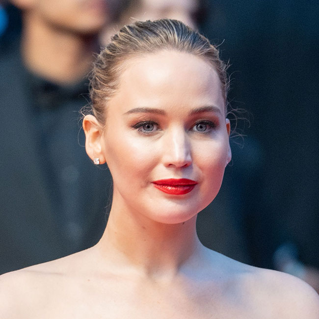 Jennifer Lawrence Wears A Tiered Pleated Dior Dress On The Cannes Red