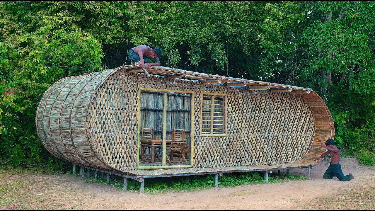 Mr. Pen Sann, Mr. Sophal and Mr. Kimhout build a bamboo villa