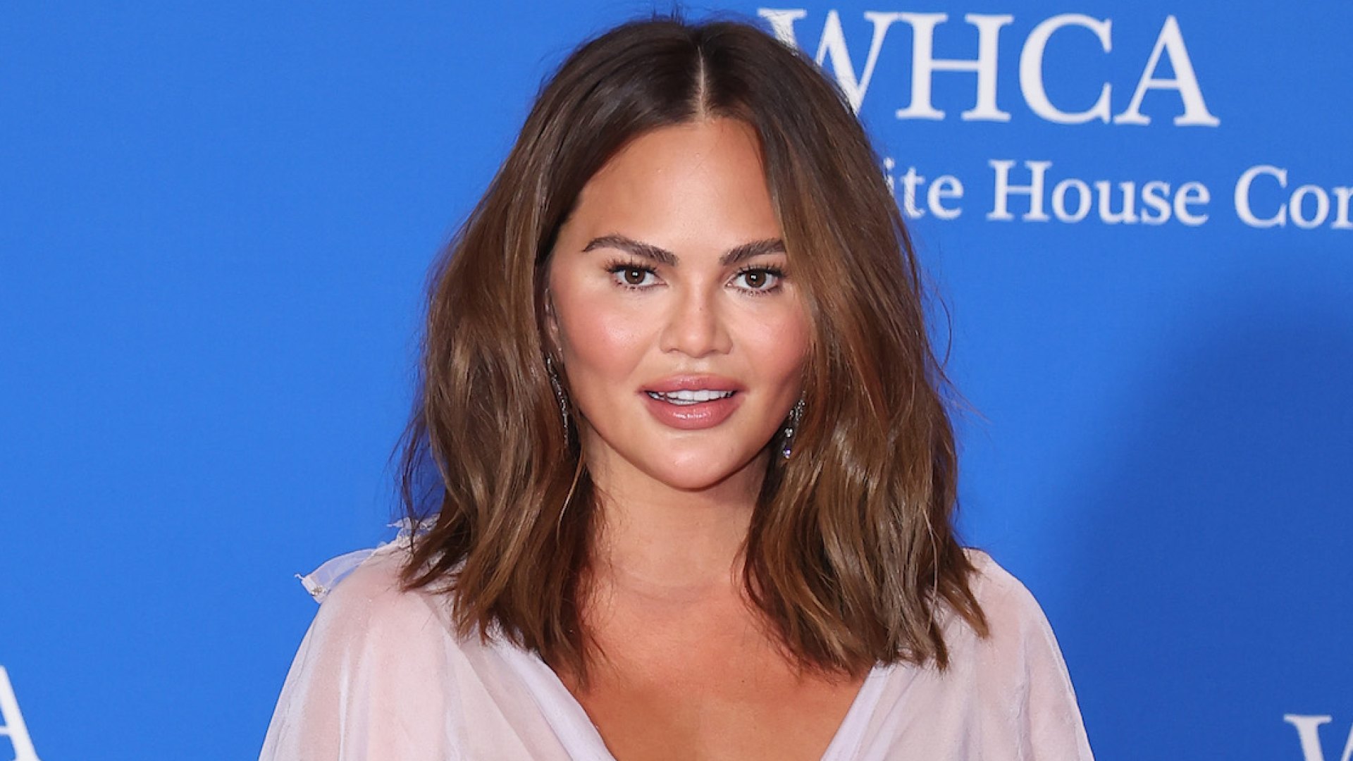 Chrissy Teigen Shows Her Bandaged Face on Instagram Live