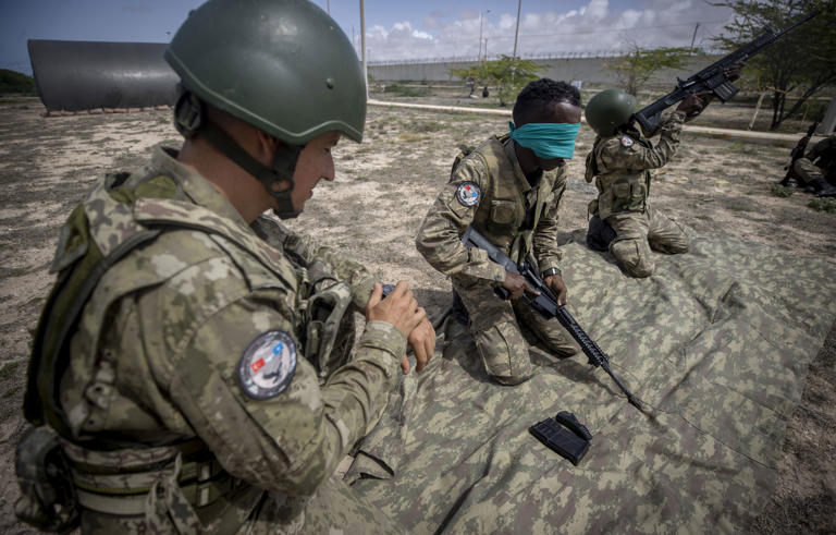 Somali soldiers participate in a military training by the Turkish armed forces' Somalia Turkish Task Force Command in May 2022 in Mogadishu.