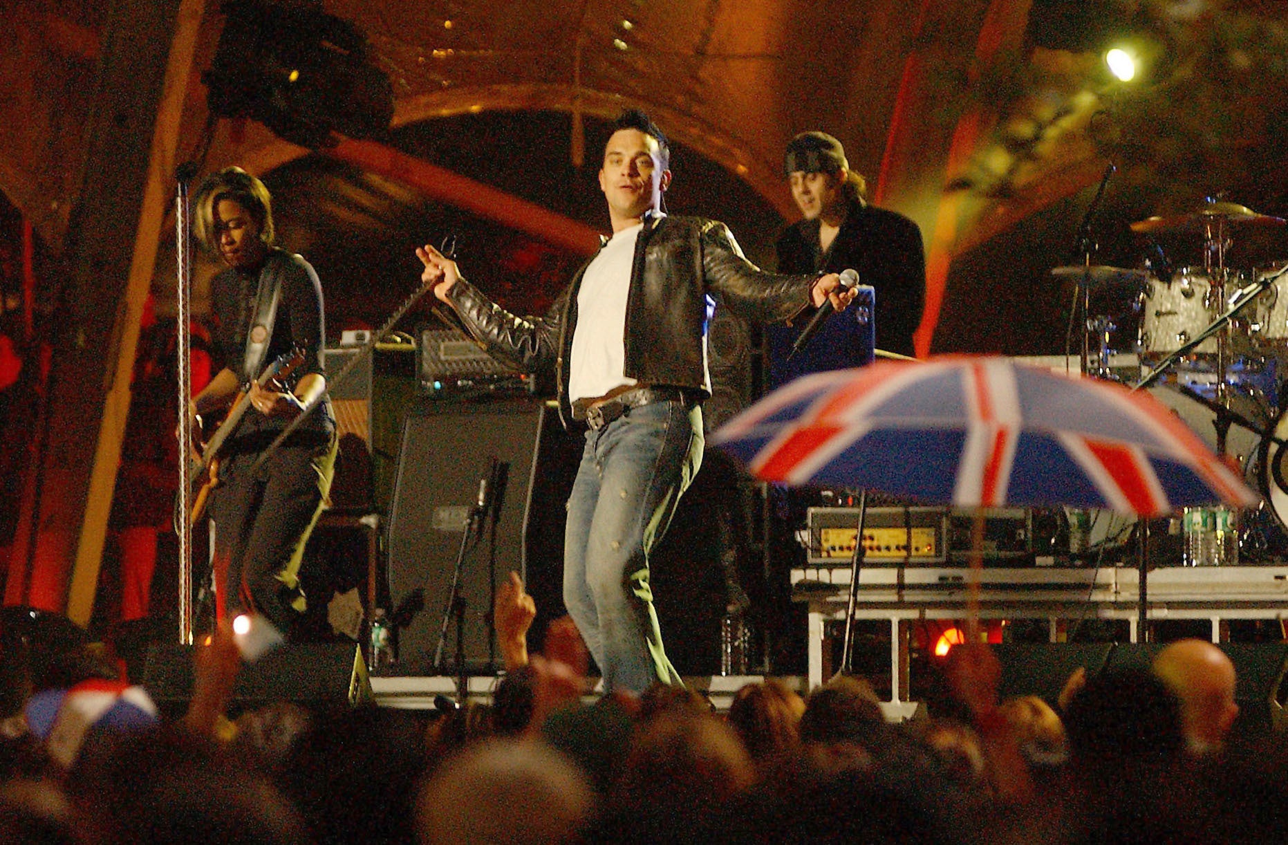 Robbie Williams performing on stage in New York City, 2003 (Rich Lee/PA)