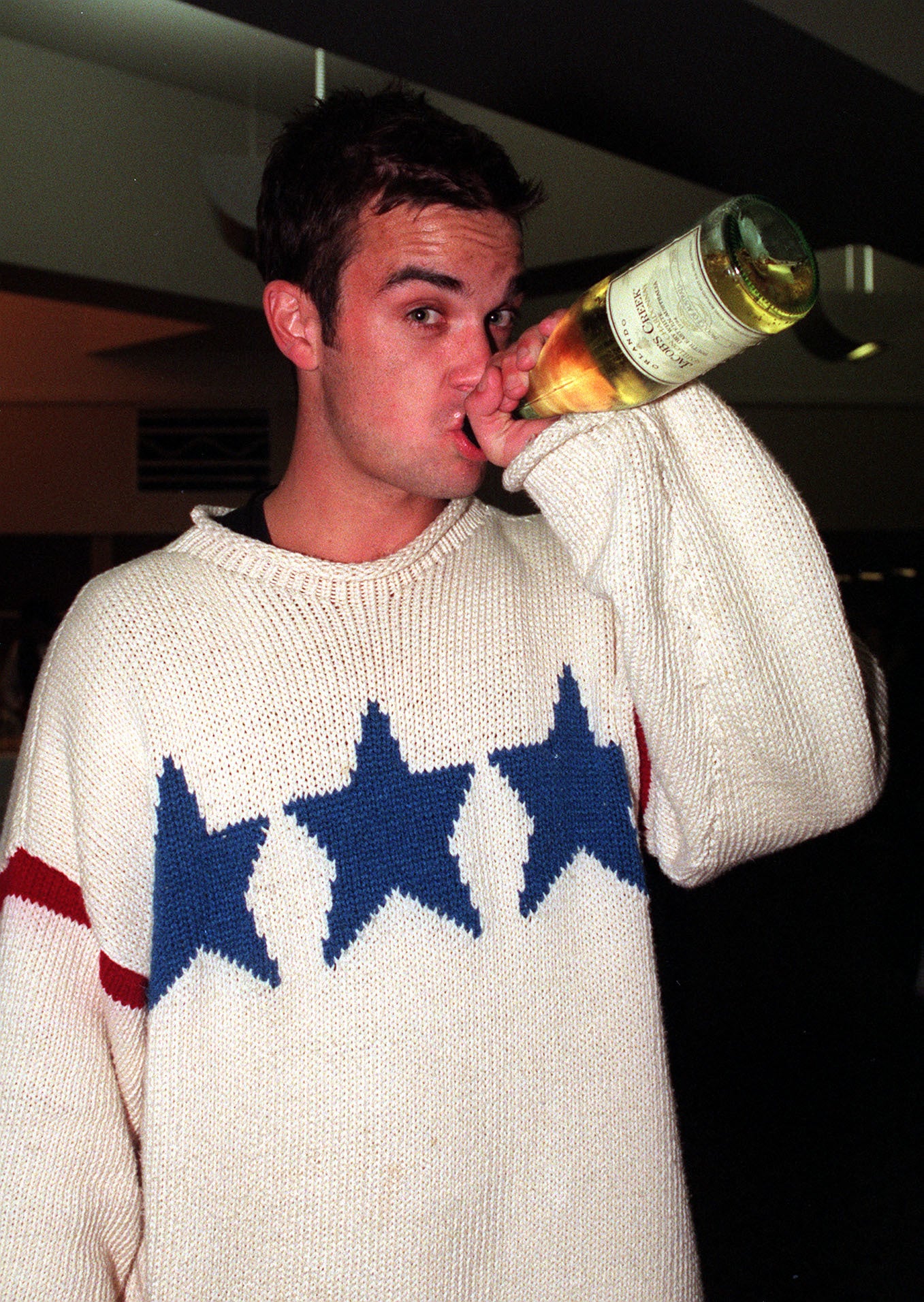 Robbie Williams backstage in 1995 (Fiona Hanson/PA)