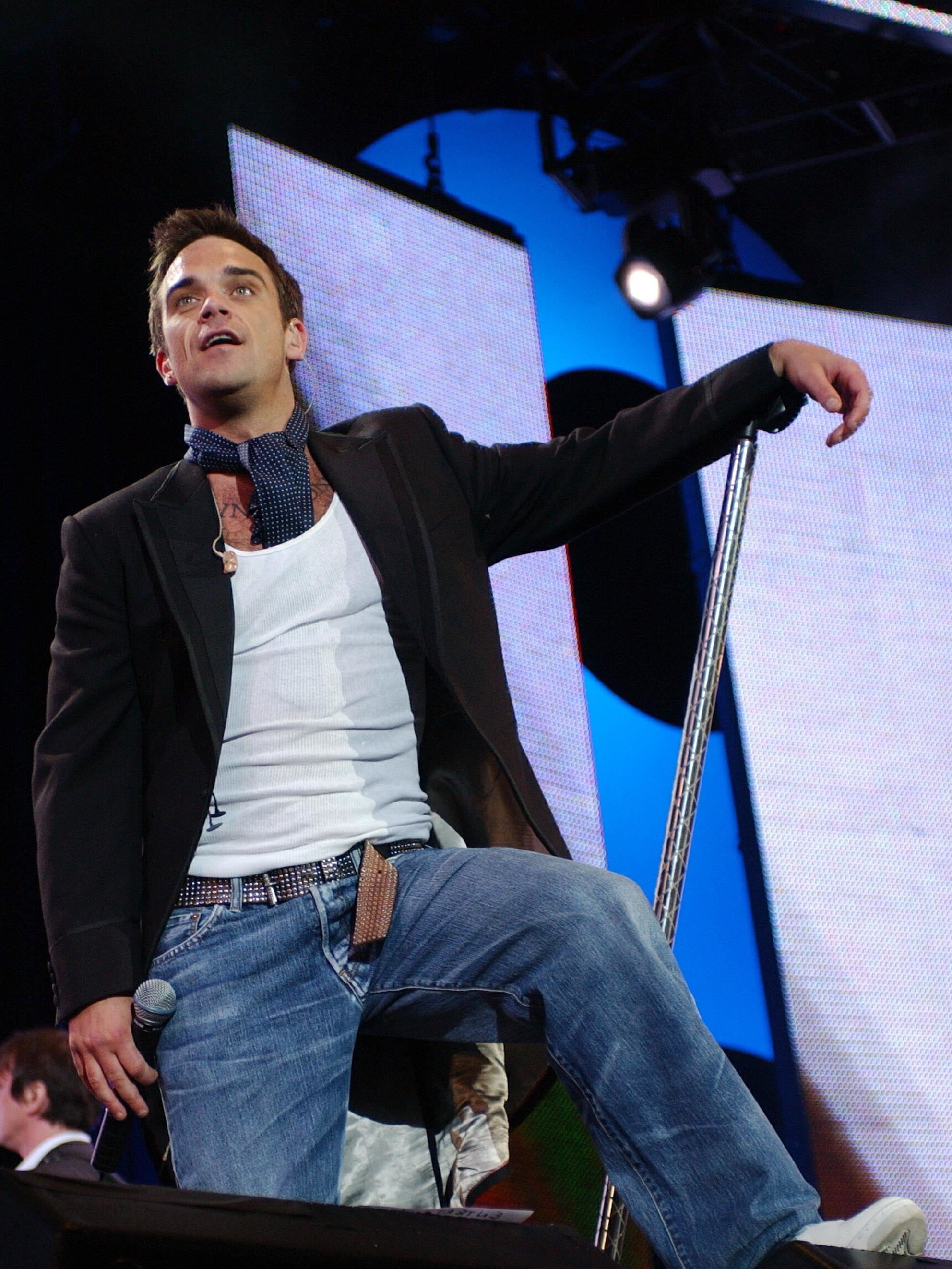 Robbie Williams performing in Hyde Park, 2005 (Yui Mok/PA)