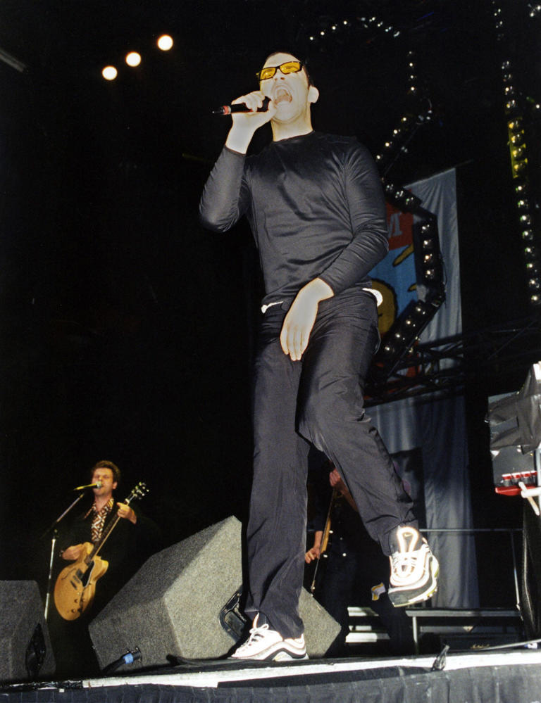 Robbie Williams on stage in 1997 (Samantha Pearce/PA)