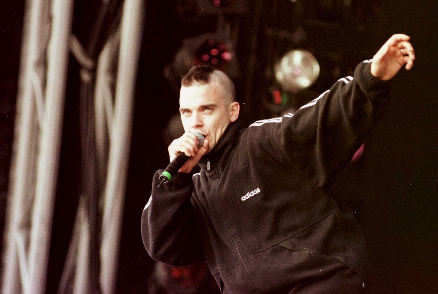 Williams’ style started to mirror Britpop bands like Oasis and Blur (PA Archive)