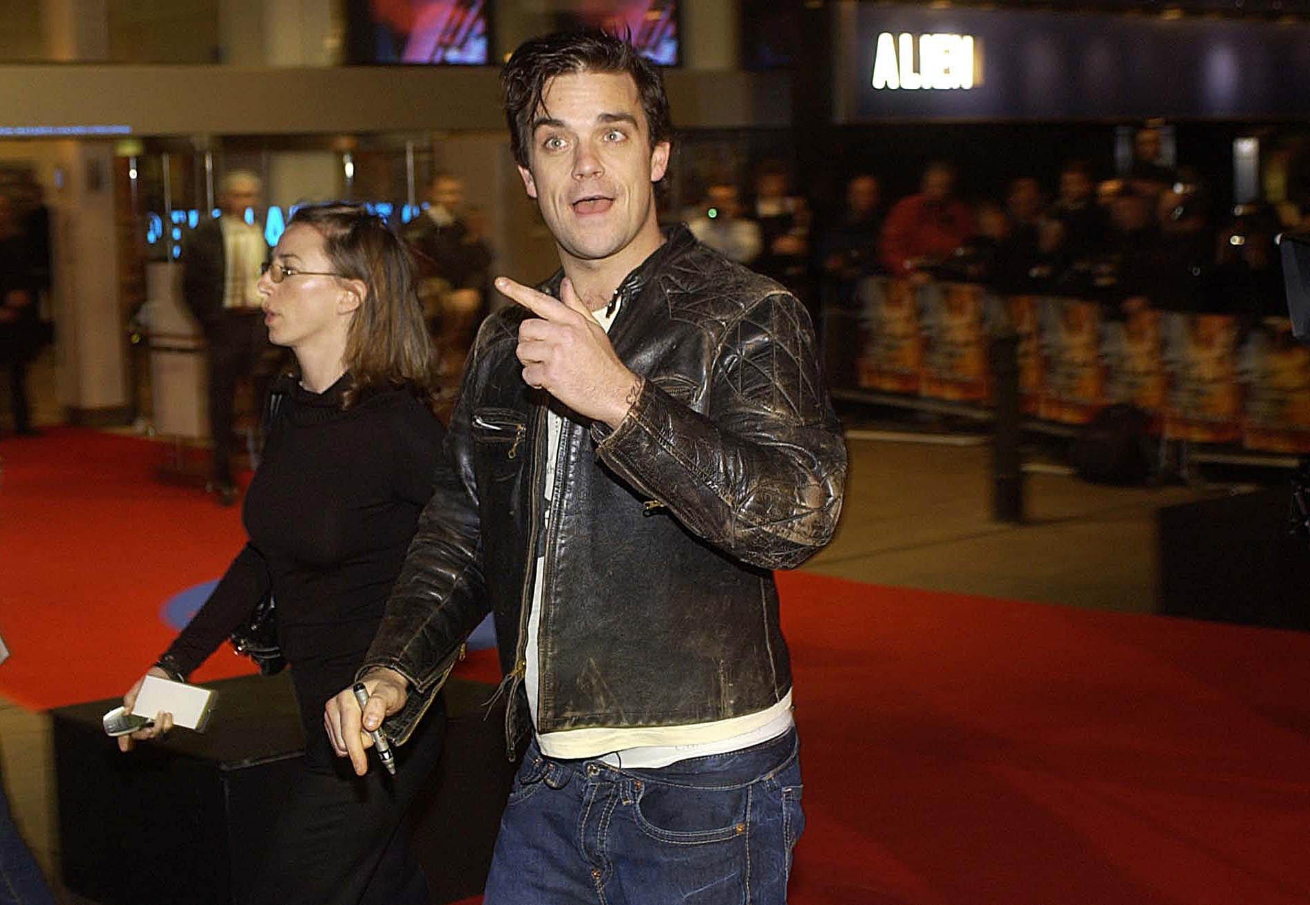 Robbie Williams sported more pared back styles after releasing Escapology (Myung Jung Kim/PA)