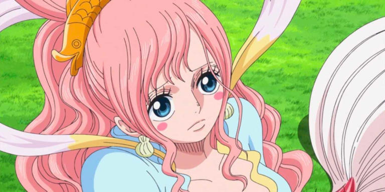 One Piece Princess Shirahoshi sits on a bed of grass with an empty expression