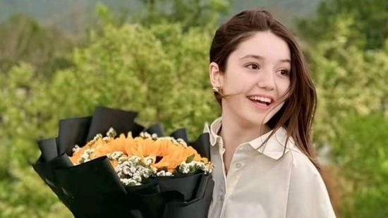 Police reportedly say the suspect, a 22-year-old man, had loitered outside her house for hours before the attack.