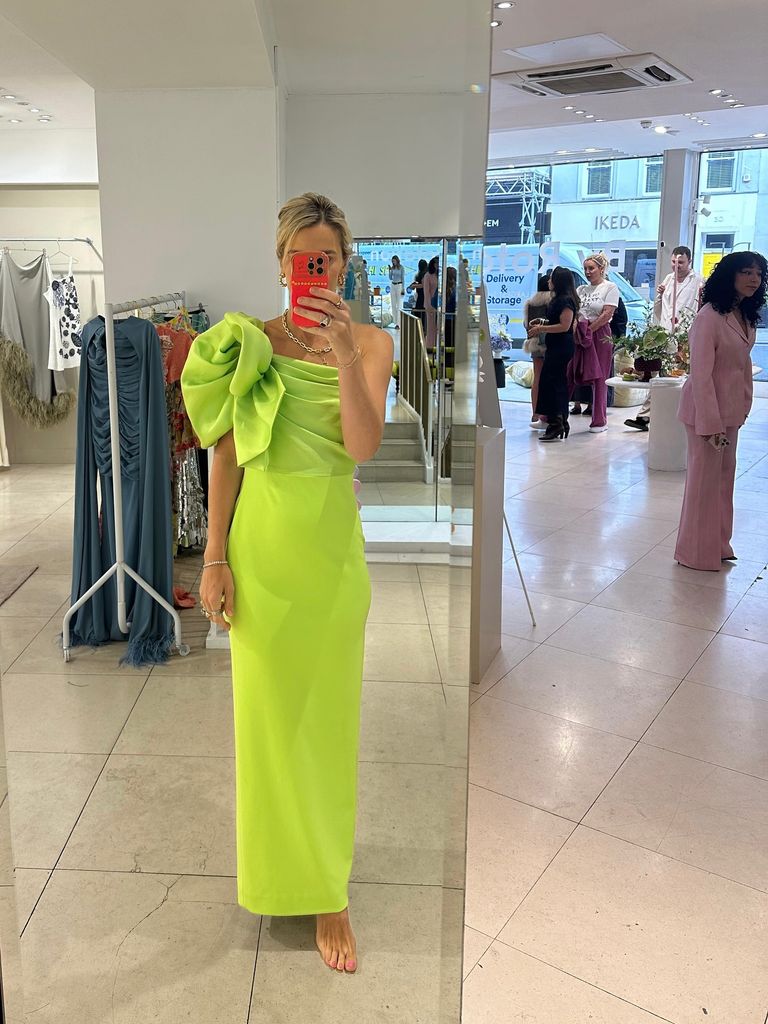 Vogue Williams divides fans with figure-skimming wedding guest dress