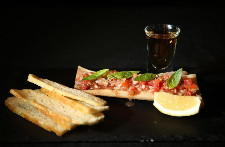  Bone marrow bruschetta with a balsamic glaze, crostinis and an Irish whiskey luge.