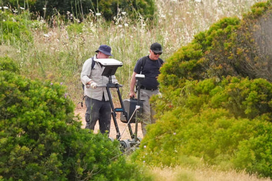 Search teams use ground penetrating radar next to a derelict and abandoned property (PA Wire)