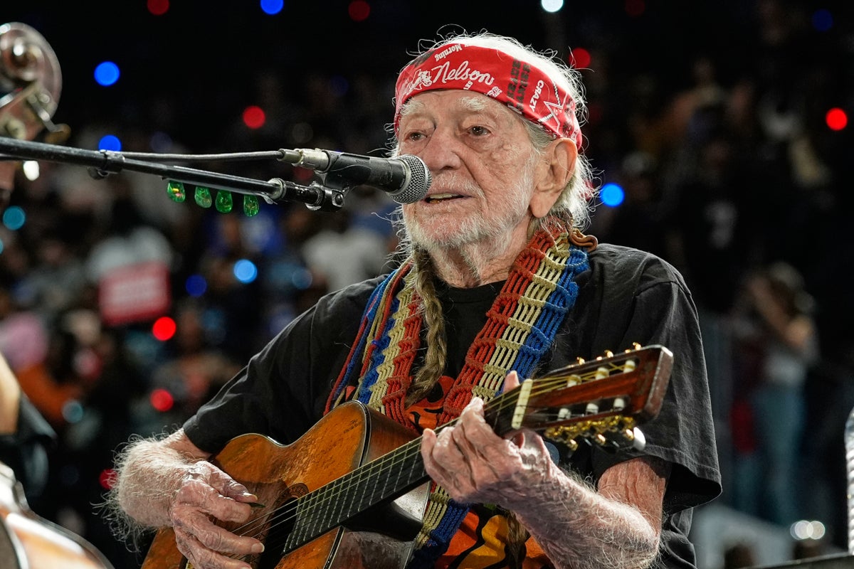 Willie Nelson keeps living the life he loves at 92. 'I'm not through with it  yet'